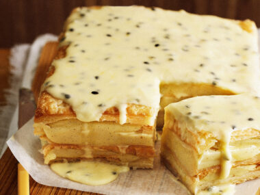 Vanilla slice recipe with passionfruit icing with square cut to show cross section