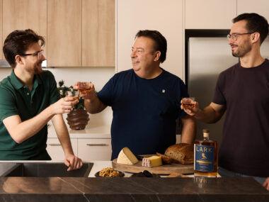 Peter Gilmore and his sons making a toast with Lark's Classic Cask Single Malt Whisky.