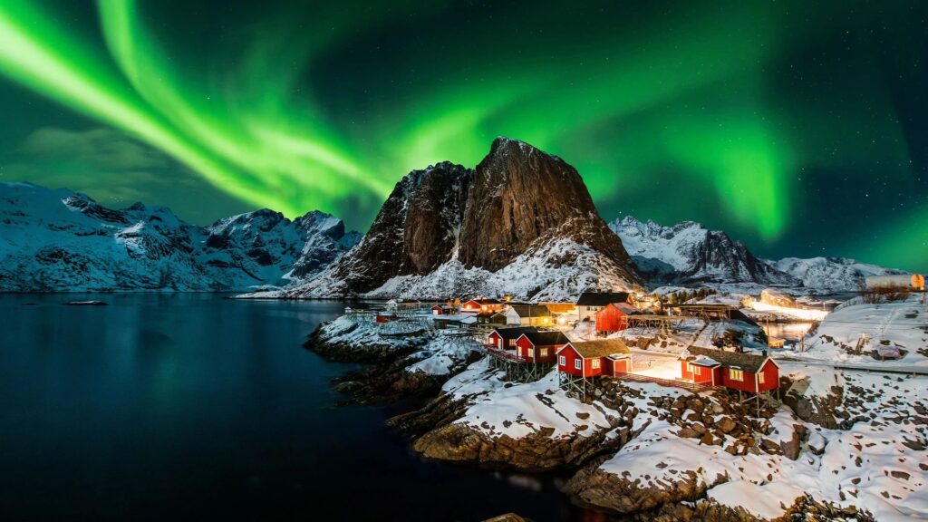 Northern lights over a village